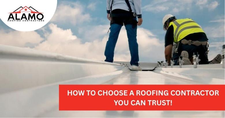 Two workers in safety gear inspect a rooftop under a cloudy sky, with a banner reading How to choose a roofing contractor you can trust! and the Alamo Roofing Contractors logo.